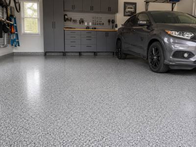 Coated garage floor back in daily use with a vehicle on it
