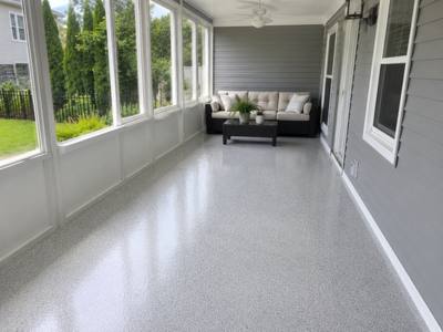Sealed slab in a glassed-in porch off the back of a house